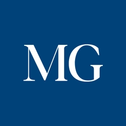 Initiale MG écrit en blanc sur un fond bleu
